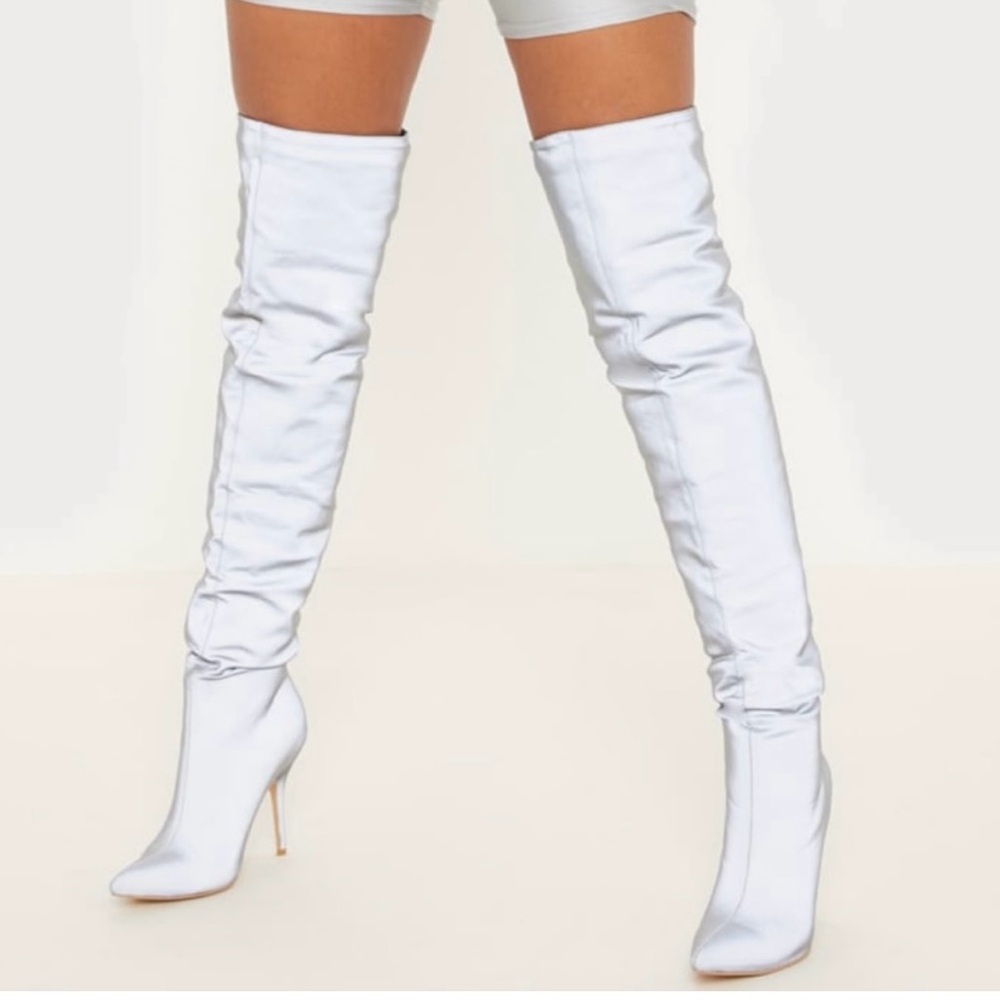 Plt reflective thigh high boots.